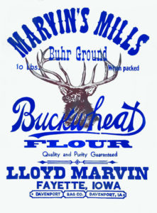 A flour sack with a buck head in the background, and